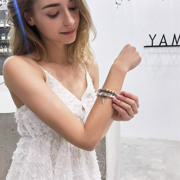 Pulsera de cuarzo rosa con el árbol de la vida de Olivenorma