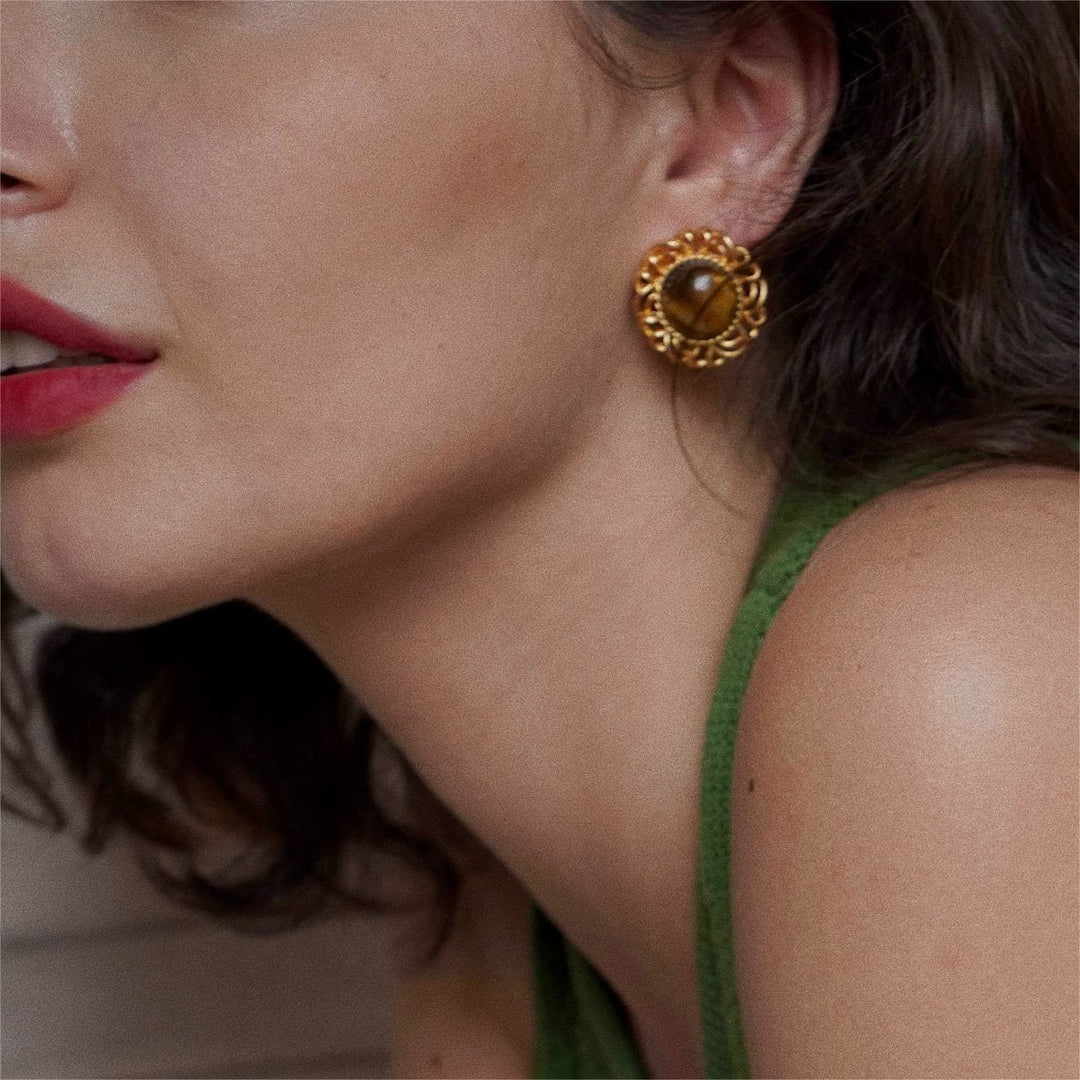 Pendientes de oro con girasol y ojo de tigre de Olivenorma
