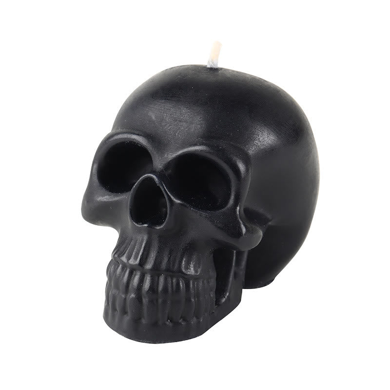 Vela perfumada con forma de calavera y calabaza de Olivenorma