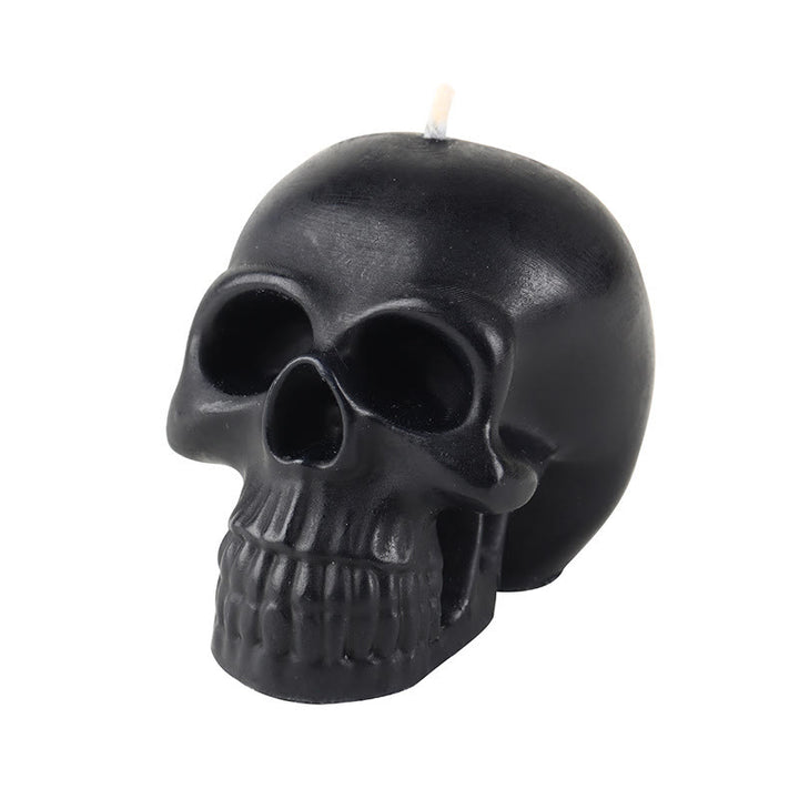 Vela perfumada con forma de calavera y calabaza de Olivenorma