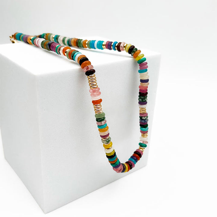 Pulsera y collar con piedras preciosas y cuentas redondas de cristal mixtas estilo bohemio de Olivenorma 