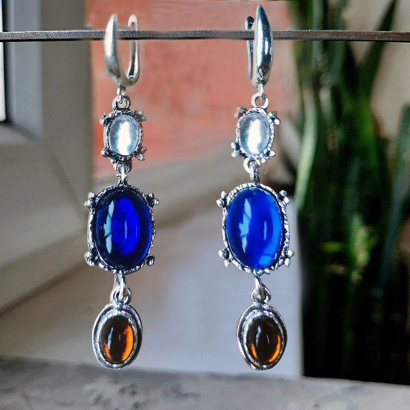Pendientes étnicos de bruja con zafiro y piedra lunar ovalada de Olivenorma