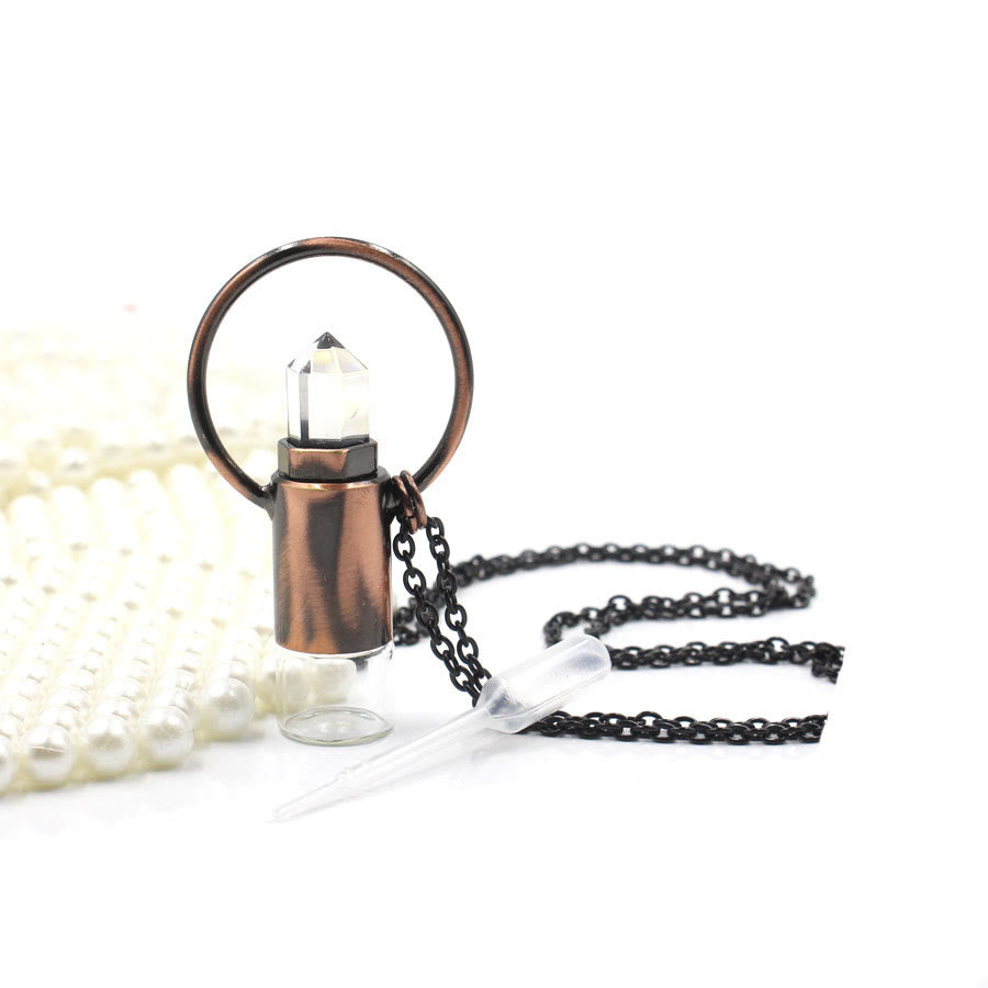 Colgante de botella de perfume con forma de bala prismática de cristal natural de Olivenorma