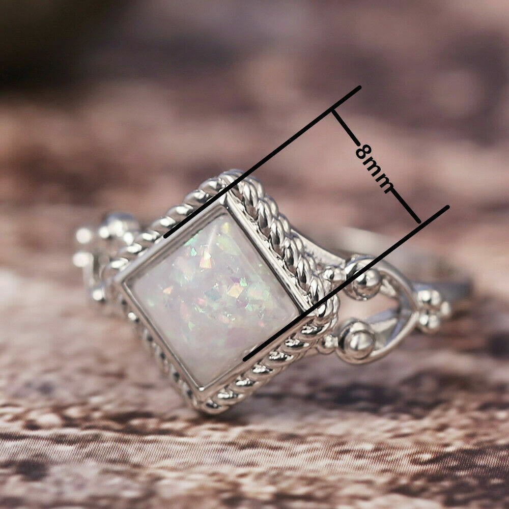Anillo de ópalo de fuego de talla ovalada de Olivenorma