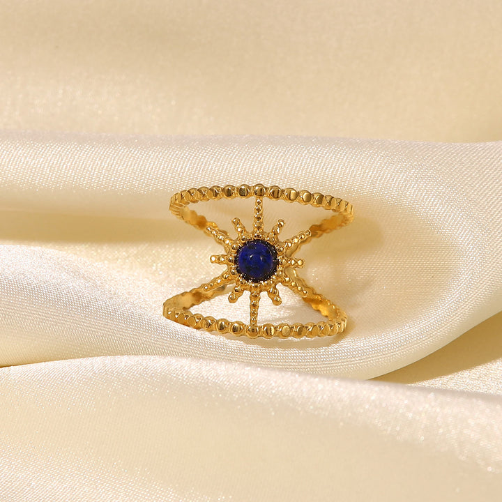 Anillo de gemas con estrella de ocho puntas y doble hilera de girasol de Olivenorma