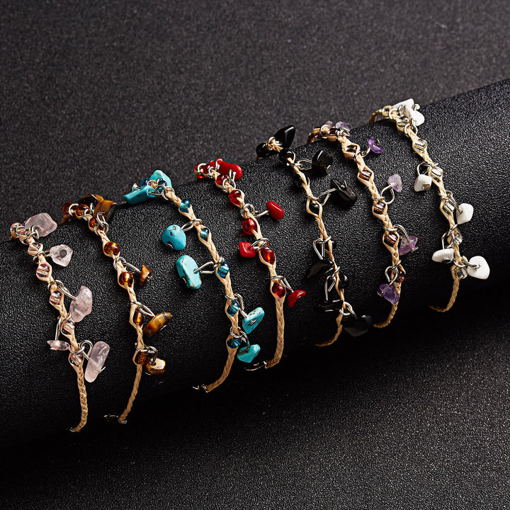 Pulsera trenzada con borlas de obsidiana, ojo de tigre y amatista de Olivenorma