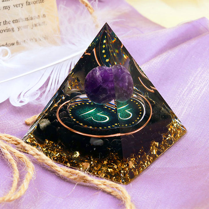 Pirámide de orgón del zodiaco Libra con esfera de amatista y obsidiana de Olivenorma 