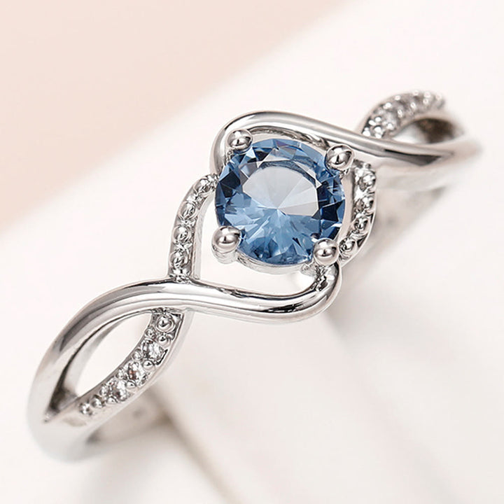 Anillo de compromiso de alejandrita azul en forma de onda de Olivenorma