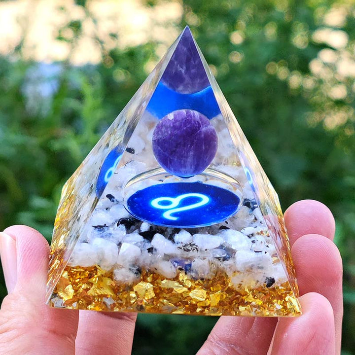 Pirámide orgónica del zodíaco Leo de amatista Olivenorma con cuarzo transparente