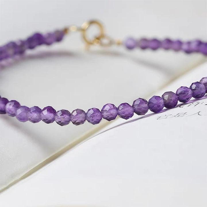 Pulsera de piedras preciosas curativas de amatista de Uruguay con puesta de sol morada de Olivenorma