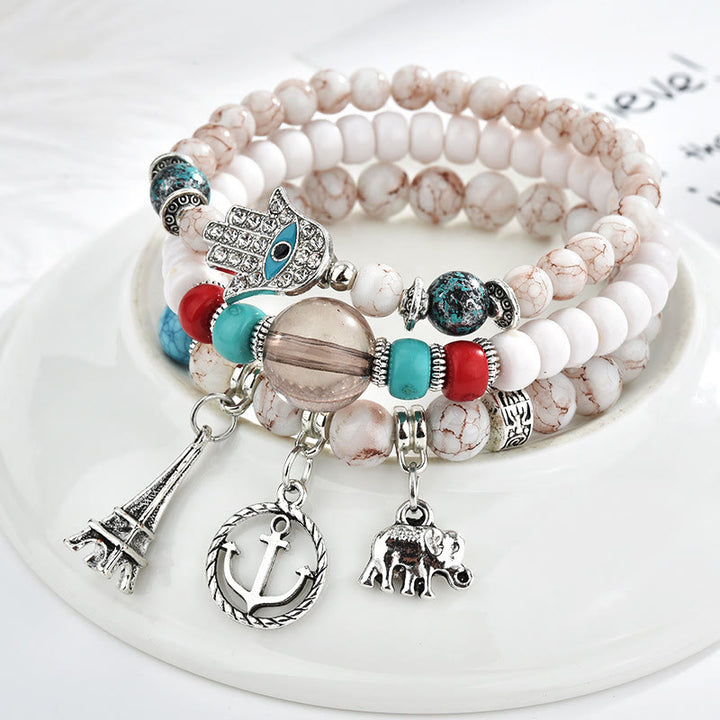 Juego de pulseras de hamsa con ojo malvado y torre de elefante de Olivenorma