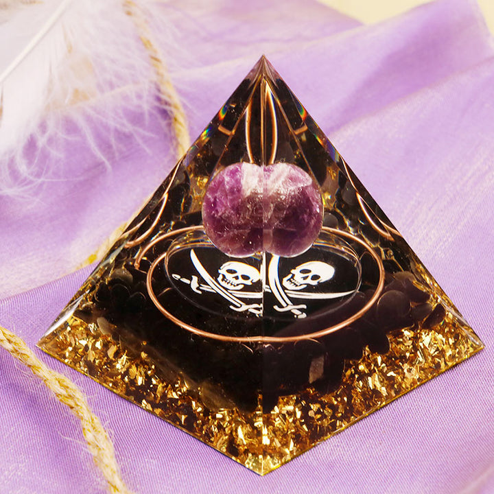 Pirámide de orgón con símbolo de calavera de amatista y obsidiana de Olivenorma