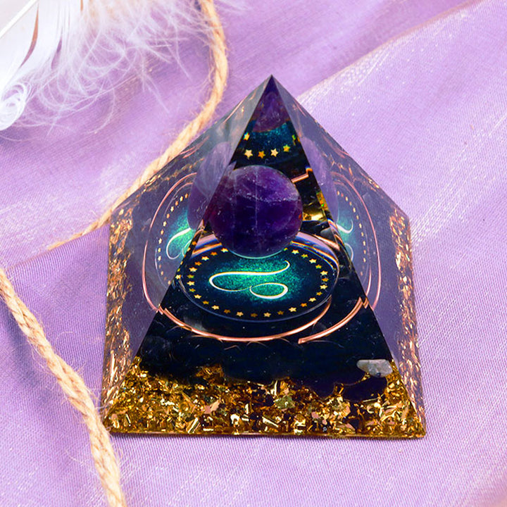 Pirámide de orgón del zodiaco Leo con esfera de amatista y obsidiana de Olivenorma 