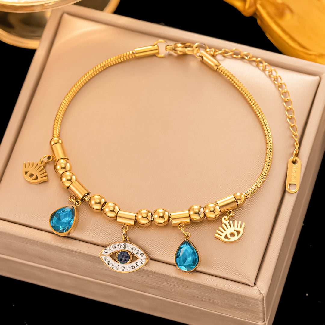 Pulsera envolvente con ojo malvado de turquesa dorada de Olivenorma