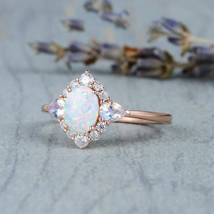 Anillo de mujer con ópalo, piedra lunar y circonita blanca de Olivenorma