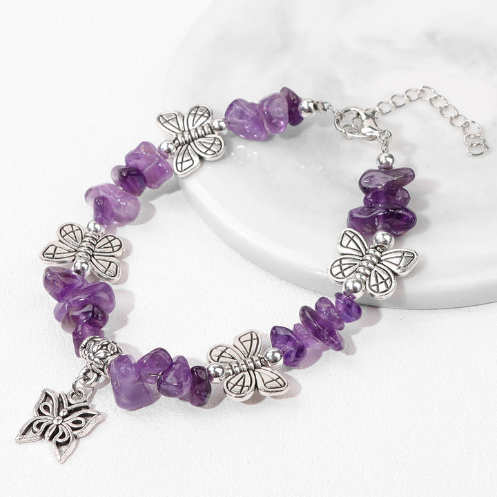 Pulsera con dije de mariposa de escombros de cristal colorido de Olivenorma