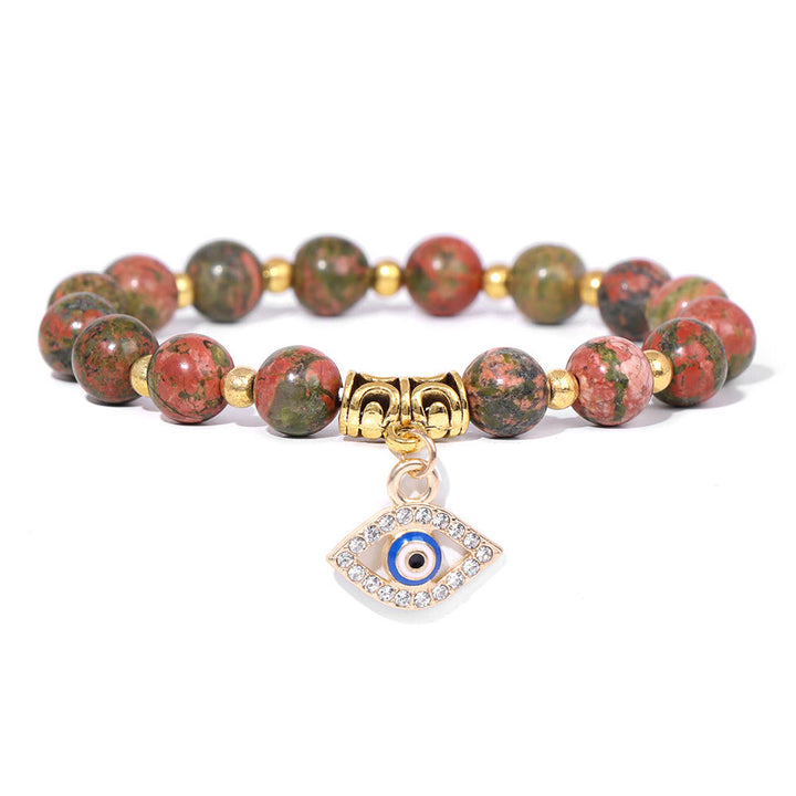 Pulsera con colgante de ojo malvado y cuentas de piedra natural de Olivenorma