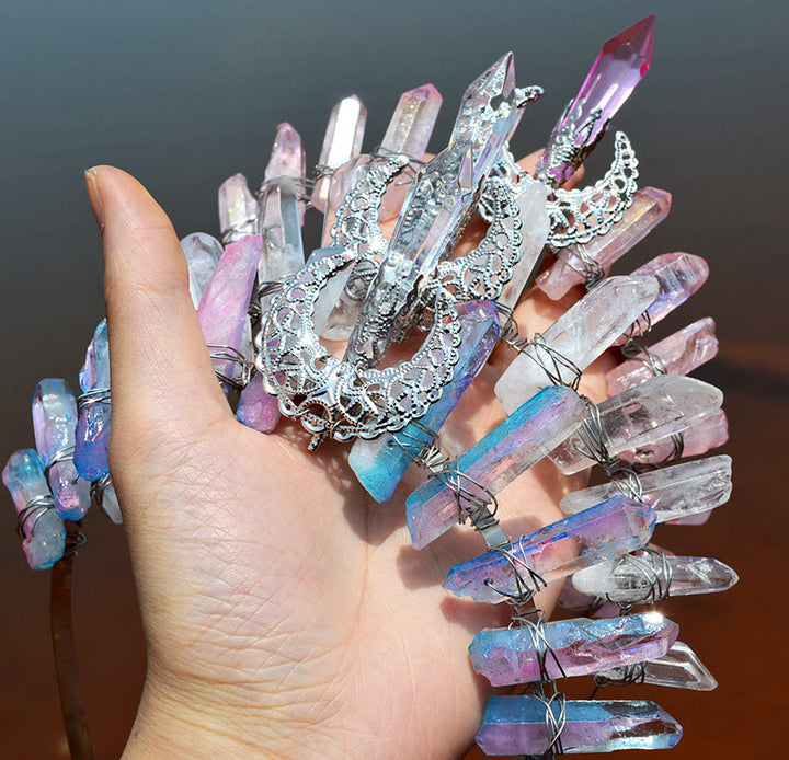 Corona de cuarzo de titanio azul y rosa de Olivenorma con pieza central de cristal