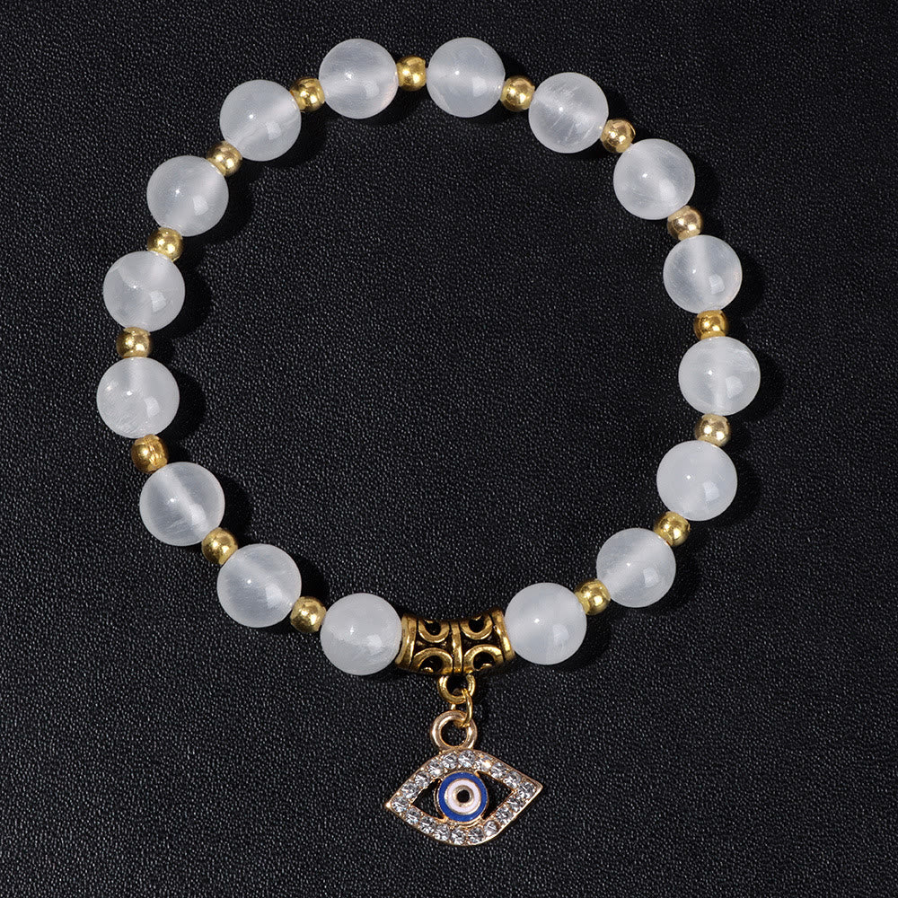 Pulsera con colgante de ojo malvado y cuentas de piedra natural de Olivenorma