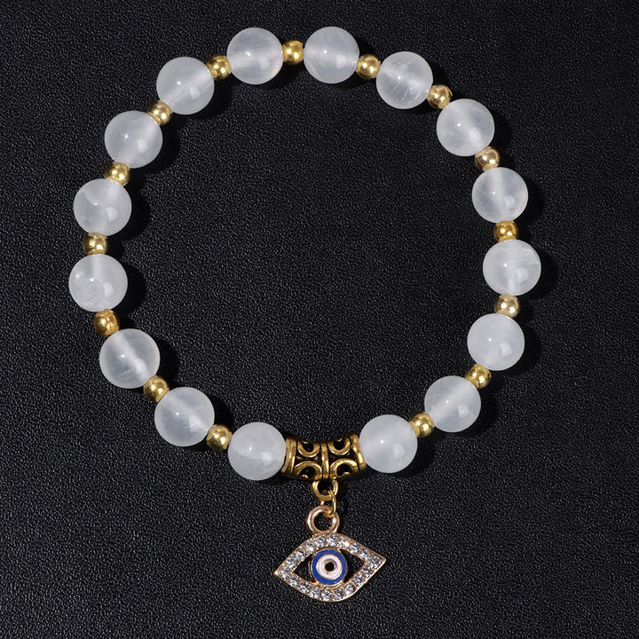 Pulsera con colgante de ojo malvado y cuentas de piedra natural de Olivenorma