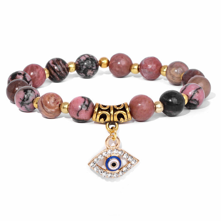 Pulsera con colgante de ojo malvado y cuentas de piedra natural de Olivenorma