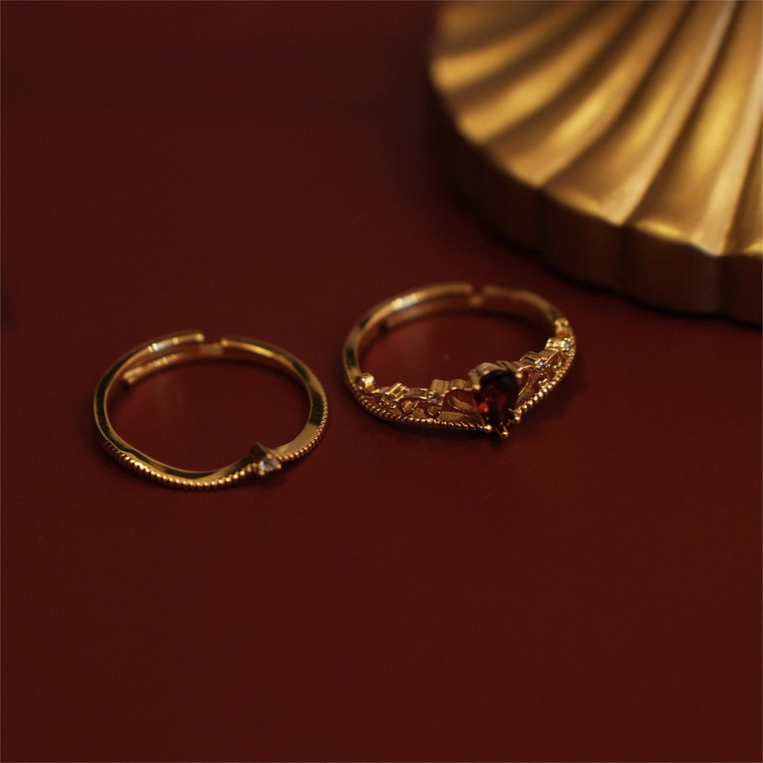 Juego de anillos ajustables apilables con corona de granate rojo de Olivenorma