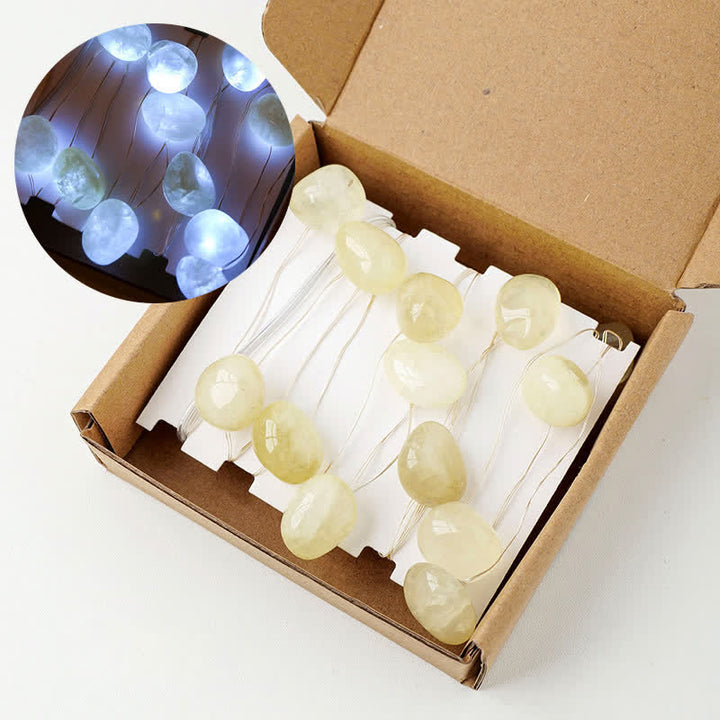 Lámpara de piedras pulidas de cristal natural de Olivenorma para decoración de ambientes navideños
