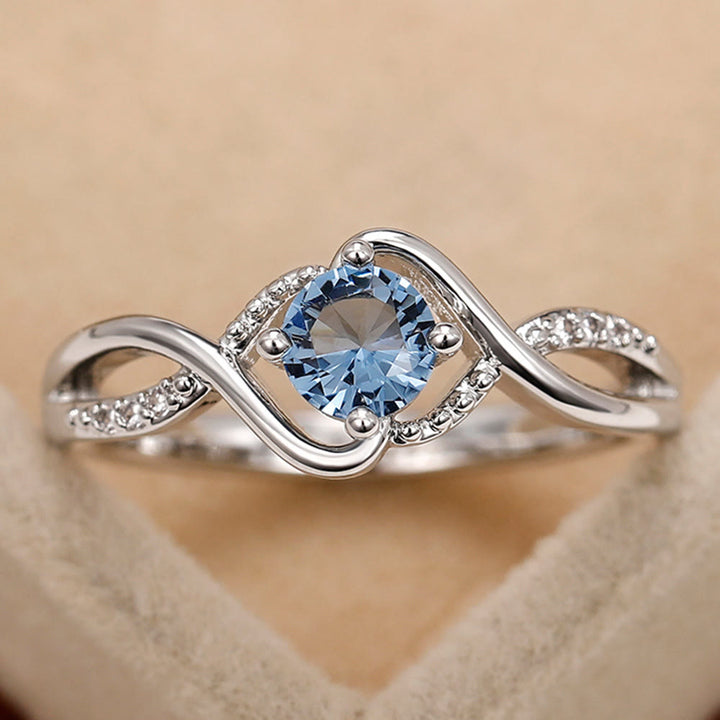 Anillo de compromiso de alejandrita azul en forma de onda de Olivenorma