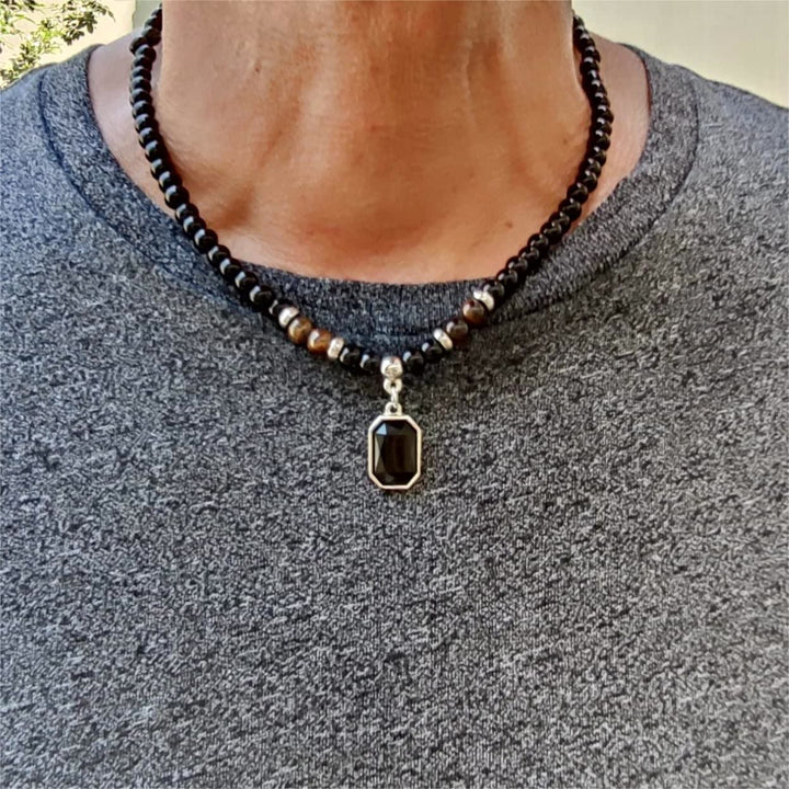 Collar de acero y titanio con cuentas de obsidiana y ojo de tigre para hombre de Olivenorma