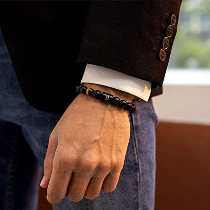 Pulsera del zodíaco de obsidiana y ojo de tigre de Olivenorma