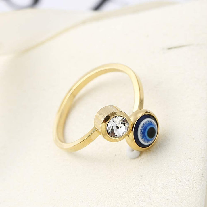 Anillo de mujer con ojo malvado bañado en oro y circonita blanca de Olivenorma 