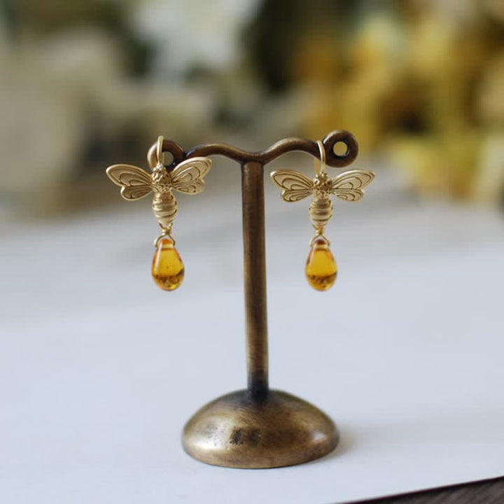 Pendientes y collar con gotas de miel de topacio y ámbar de Olivenorma