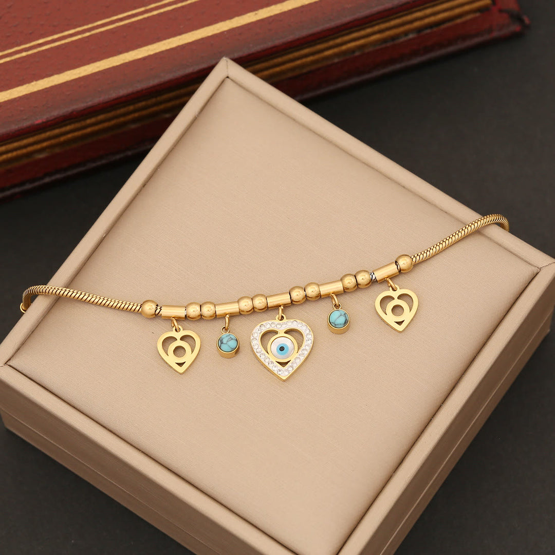 Pulsera, pendientes, collar y ojo malvado con circonitas y turquesa de Olivenorma 