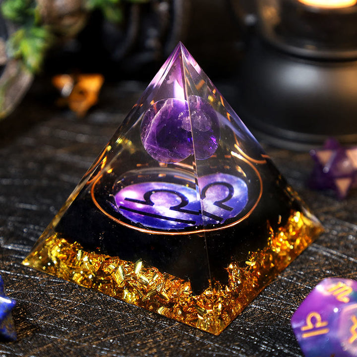 Pirámide de orgón de obsidiana con bola de amatista y grava de Olivenorma 