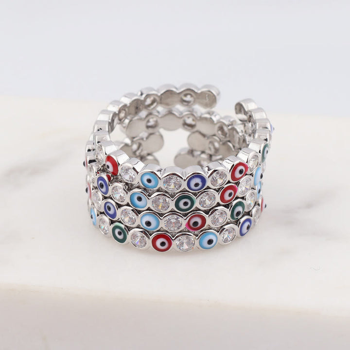 Anillo ajustable con circonita blanca y ojo malvado de colores de Olivenorma 