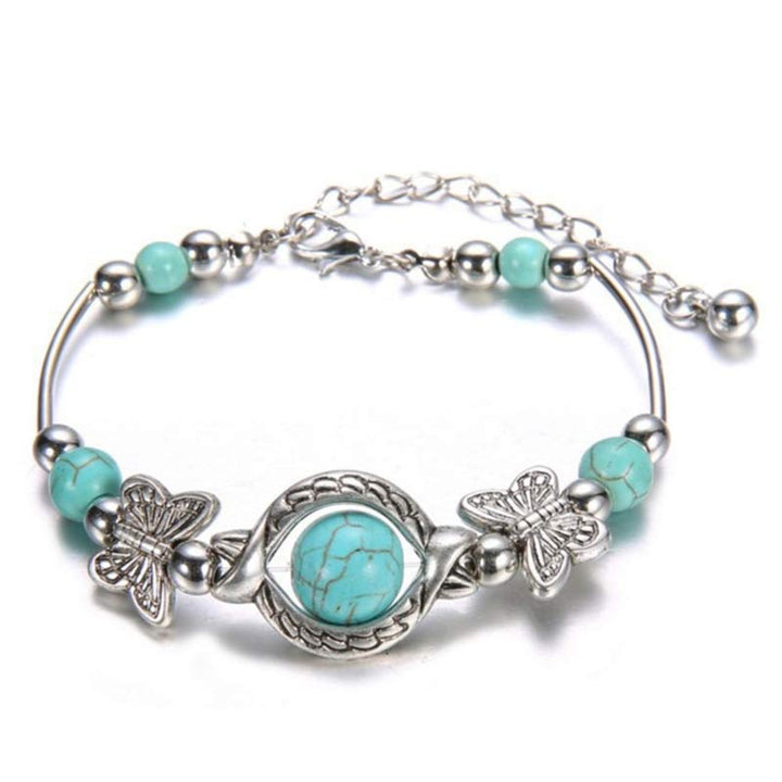 Pulsera de mariposa con esfera turquesa de Olivenorma