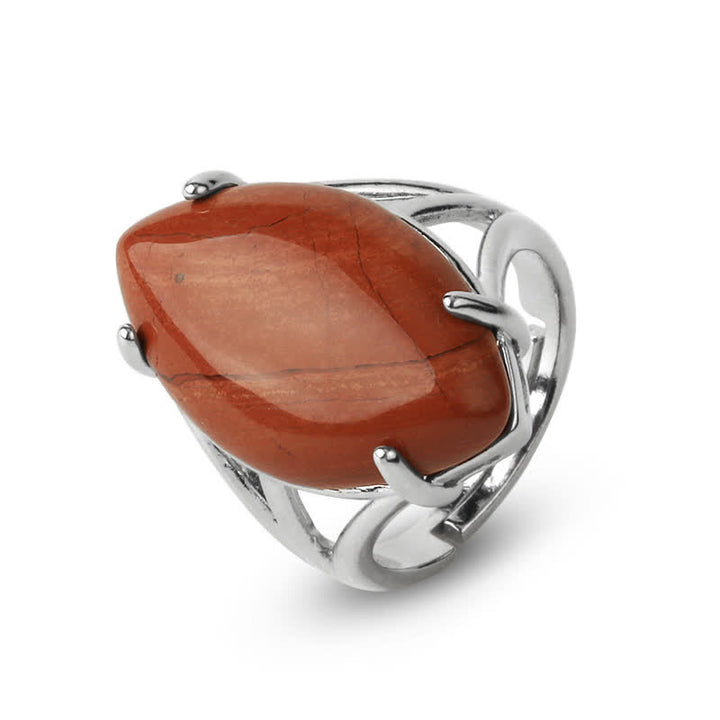 Anillo ajustable con forma de semilla de melón y amatista de Olivenorma