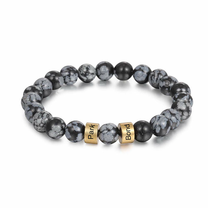 Pulsera de hombre personalizada con cuentas grabadas en piedra natural de Olivenorma