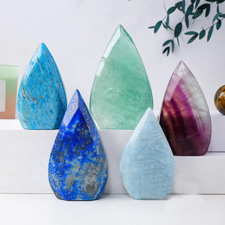 Adornos de piedras preciosas con forma de llama de cristal natural de Olivenorma