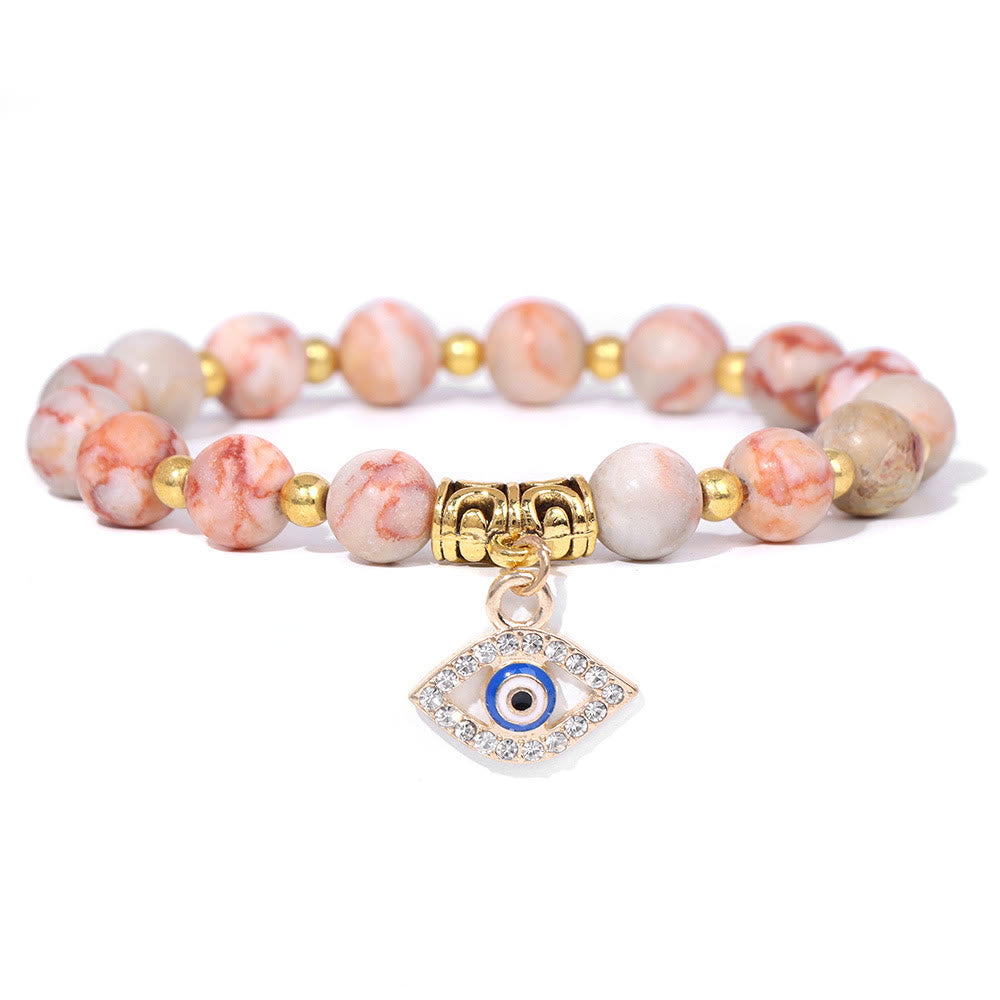 Pulsera con colgante de ojo malvado y cuentas de piedra natural de Olivenorma