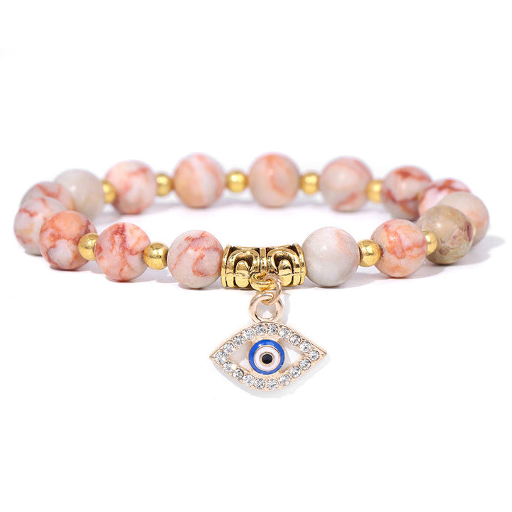 Pulsera con colgante de ojo malvado y cuentas de piedra natural de Olivenorma