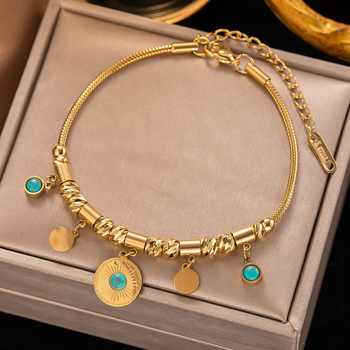 Pulsera envolvente con ojo malvado de turquesa dorada de Olivenorma