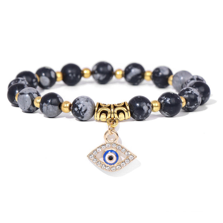 Pulsera con colgante de ojo malvado y cuentas de piedra natural de Olivenorma