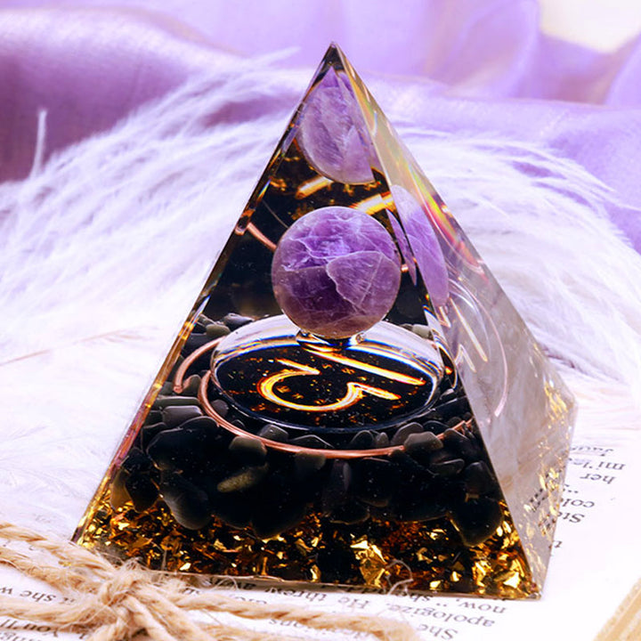 Pirámide de orgón del zodiaco Libra con esfera de amatista y obsidiana de Olivenorma 