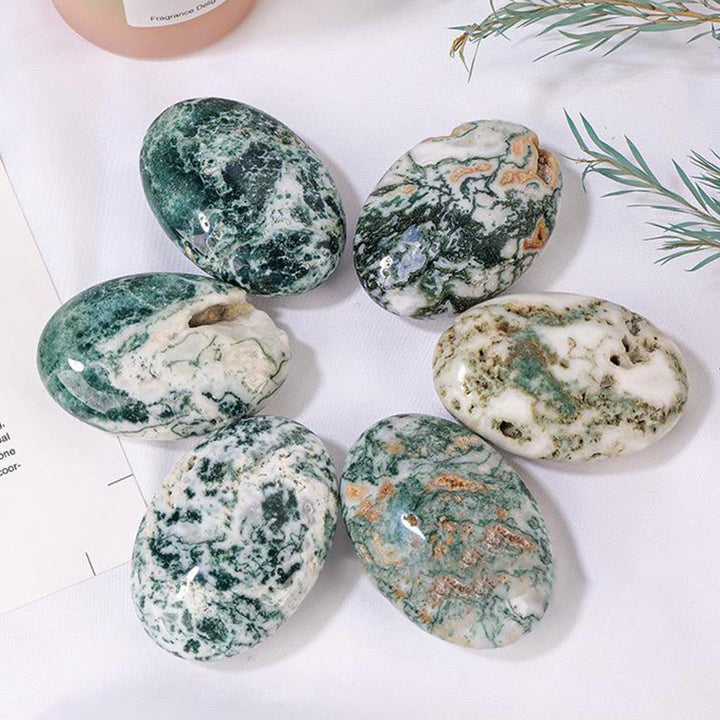 Compresa caliente de ágata musgosa de Olivenorma para masajes de belleza con piedra natural