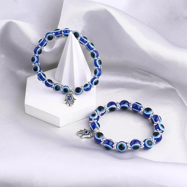 Pulsera curativa con símbolo de mal de ojo y hamsa