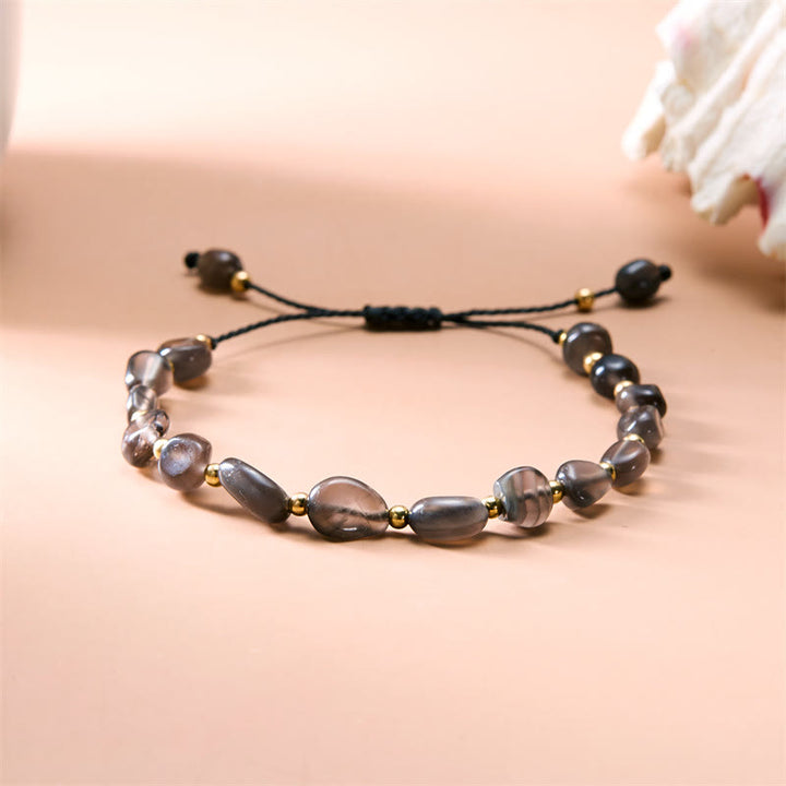 Pulsera tejida a mano con cuentas de piedra irregulares naturales de Olivenorma