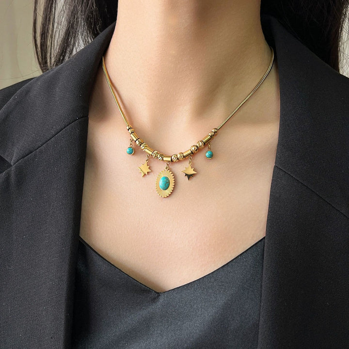 Pulsera envolvente con ojo malvado de turquesa dorada de Olivenorma