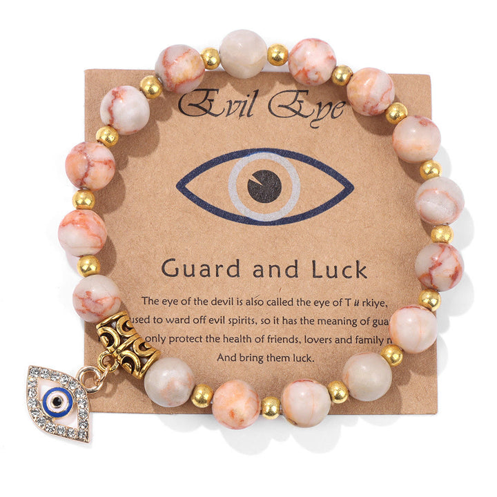 Pulsera con colgante de ojo malvado y cuentas de piedra natural de Olivenorma