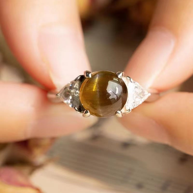 Anillo de piedra de ojo de gato verde dorado con cuatro garras de Olivenorma 
